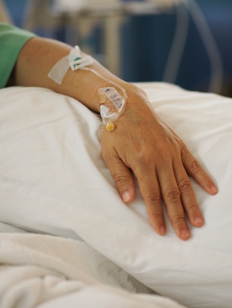 Hand Patients sleep to saline at the hospital wardの写真素材