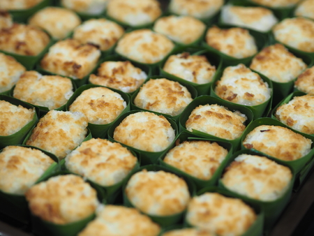 Thai dessert sweets in banana leavesの写真素材