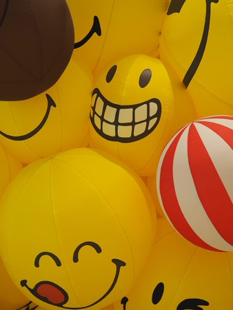 Smile Smiley face yellow ball balloon happyの写真素材