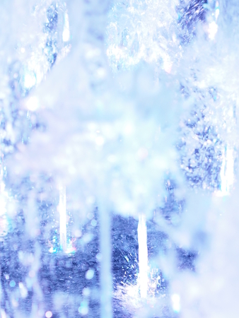 blurred motion of the fountain blue color light for background abstract effectの写真素材