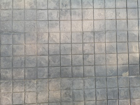 square shape  stamp black color block pattern concrete material cement backgroundの写真素材