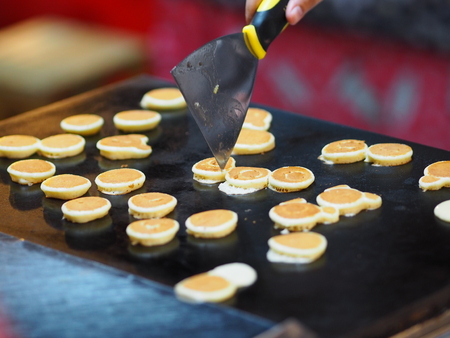 cooking pancake Dessert on steel panの写真素材