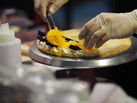 Crepe filling with cream Fruit ice-cream dessertの写真素材