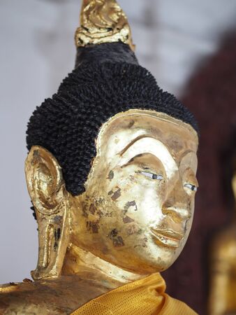 Brass Buddha statue in the temple Chapelの写真素材