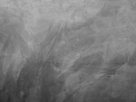 Dark Cement wall concrete polished textured background abstract grey color material smooth surface, Grunge paint monochrome backdrop for image for also art card greettingの写真素材