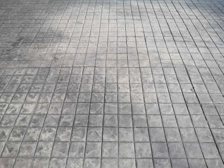 Stamp concrete black grey color hardener printing patterns on the cement or mortar surface block...