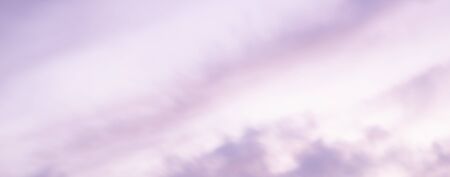 Great sky with sunset clouds all possible shades of pink and purple, big nature background.の写真素材