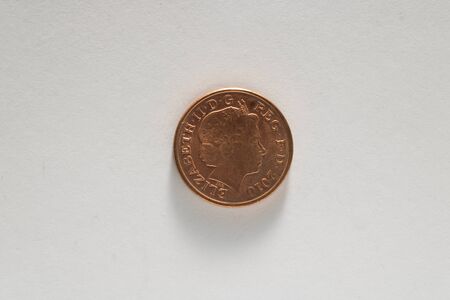One penny coin isolated on white backgroundの写真素材
