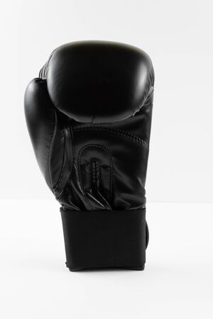 Close-Up Of Boxing Glove Over White Background - photography of stockの写真素材