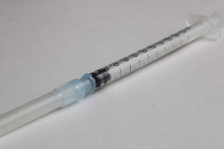 syringe with isolated medical needle on white background, medical materialの写真素材