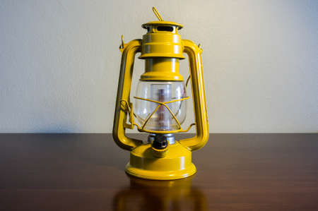 old-style yellow lantern made with steel, use as decorationの写真素材