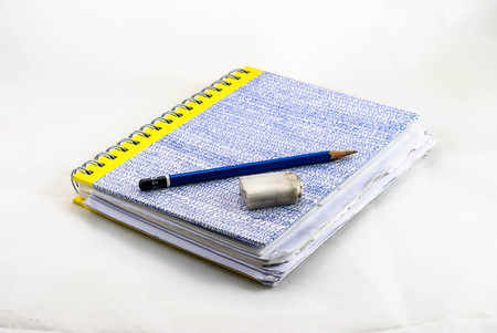 sketchbook with pencil and eraser isolated in white の写真素材