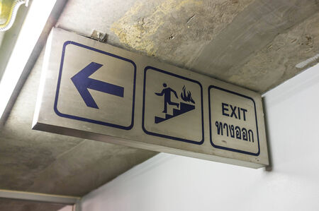 emergency exit sign in modern office building