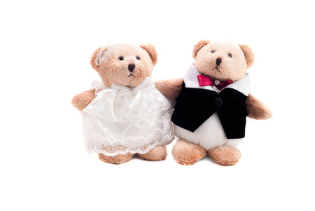 teddy bear in wedding dress for wedding present isolated in white background with clipping pathの写真素材