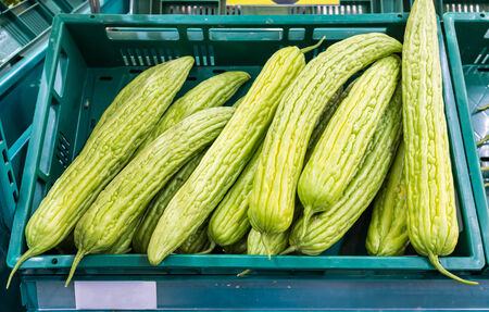 fresh chinese bitter gourd selling in supermarketの写真素材