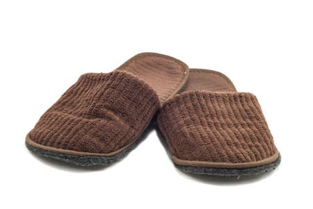 premium brown comfortable slippers isolated in white background with clipping pathの写真素材