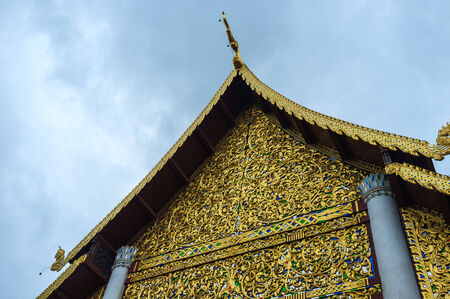 traditional thai crafted architecture in buddhist templeの写真素材