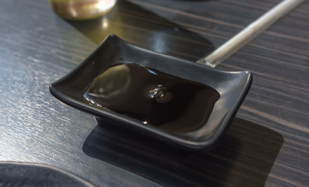 soy sauce for dipping with sushi in Japanese restaurantの写真素材