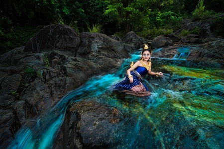 The Angel Fashion at Wang Mai Pag Waterfall in Thailand.の写真素材