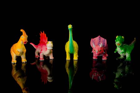 Dinosaur Toy Isolated On black acrylic.This is low-key photoの写真素材