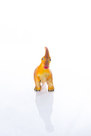 Dinosaur Toy Isolated On White acrylic.This is high-key photoの写真素材