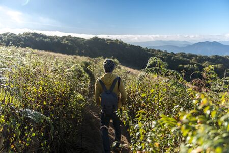Tourist man walk in Kew Mae Pan Nature Trail in Doi Inthanon National Park - Chiang Mai, Thailand
