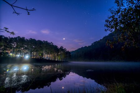 Stars night sky at Pang Ung lake, Pang Ung Mae Hong Son province, North of Thailandの写真素材