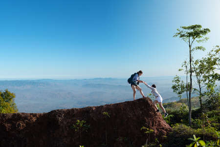 Group of asian female hipster hiking on mountain holidayの写真素材