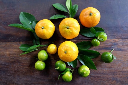 Oranges on a wooden tableの写真素材