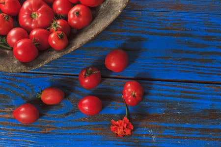 tomatoes in wooden buckets,crops, fruits and vegetables, garden, ohorodyna wild berryの写真素材