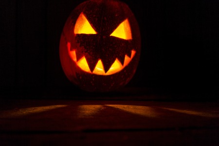 dirty and scary table and pumpkin head in the background,holiday, October 31, Halloweenの写真素材