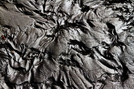 sandy bottom cut by spring brook,texture, ice, snow, the onset of spring, melting glaciers, warming...
