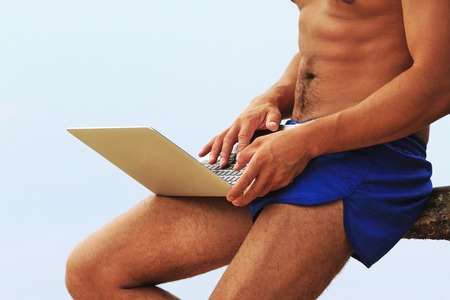 man works on a laptop in the nature , Technologyの写真素材