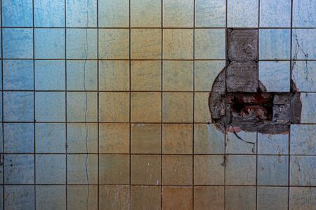 scary tile with rust in a dark roomの写真素材