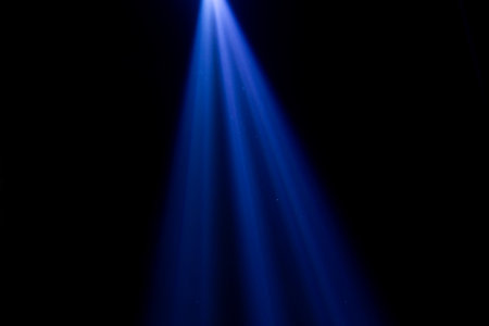 blue beam illuminates the dark scene, celebrationの写真素材