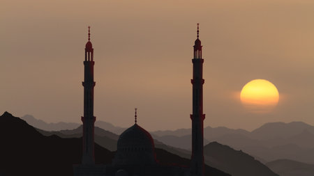 mosque against the background of mountains and setting sunの写真素材