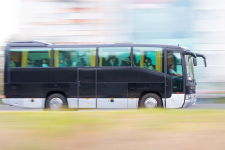 Passenger tour bus in urban traffic