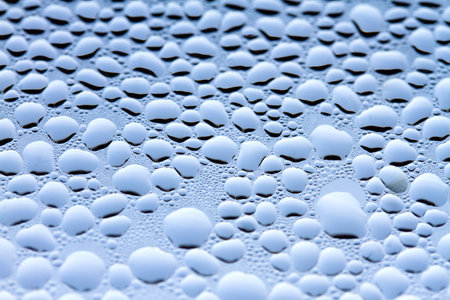 Macro Water Drops on Glass. Blue Condensation Backgroundの写真素材