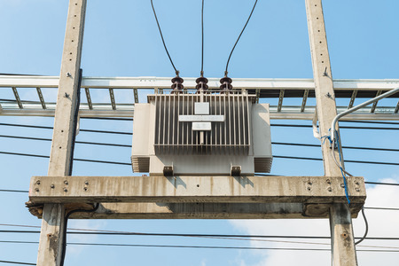 Electric transformer on the pole, Transform Electric high voltage to low voltageの写真素材