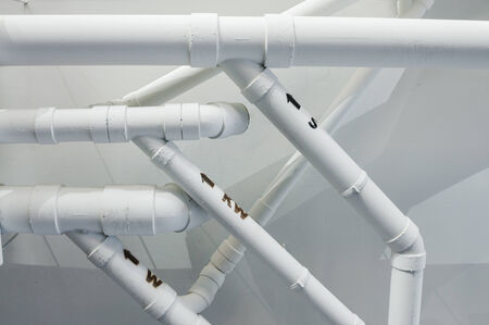 pipeline on building ceilingの写真素材