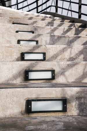 Cement staircase with illuminated boxの写真素材