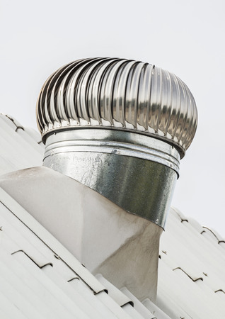 A roof ventilator for heat control in industrial factory and hall の写真素材