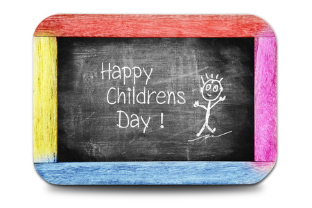 Happy childrens day! Hand writing text on chalkboard.の写真素材
