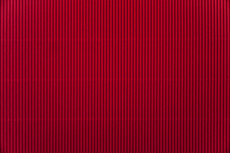 Red corrugated paper backgroundの写真素材