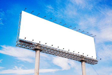 Blank billboard against blue sky for new advertisementの写真素材