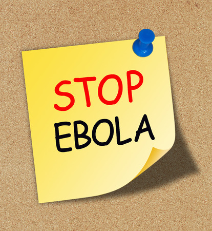 Stop Ebola word written on a yellow note paper.の写真素材