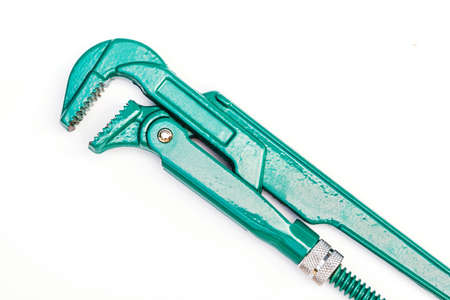 Plumbing wrench over white, adjustable pipe wrench.の写真素材