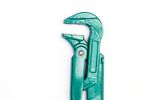 Plumbing wrench over white, adjustable pipe wrench.の写真素材