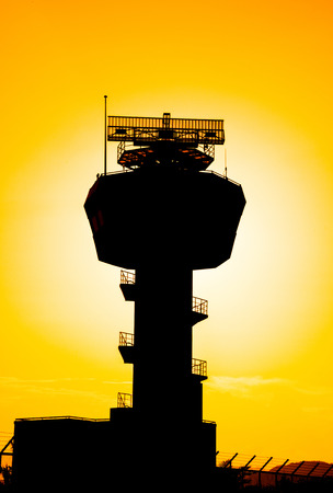 Silhouette radar communication tower in evening.の写真素材