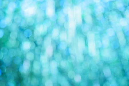 Abstract background with bokeh defocused lightsの写真素材